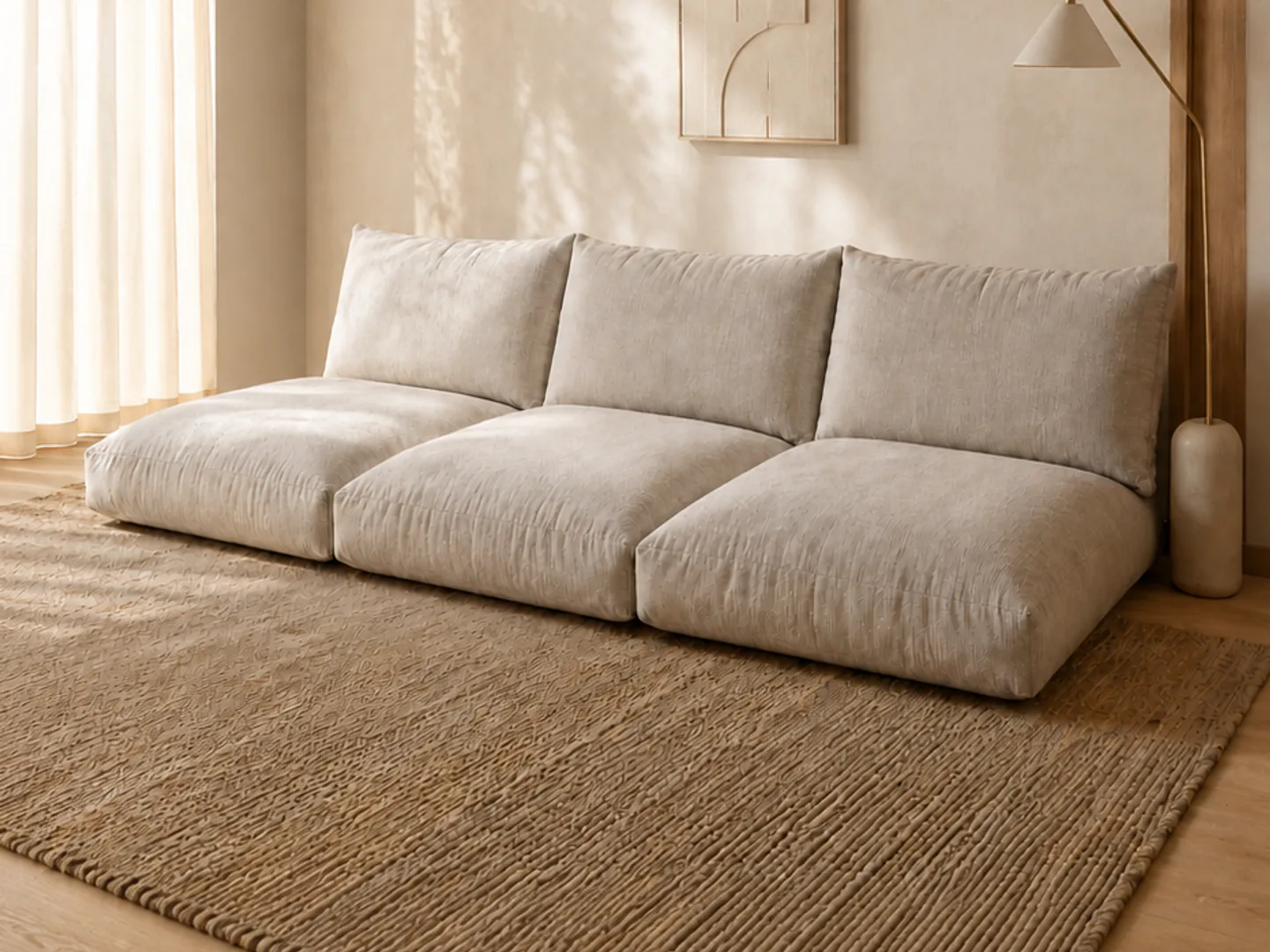 Three custom upholstered floor cushions arranged as low-level seating