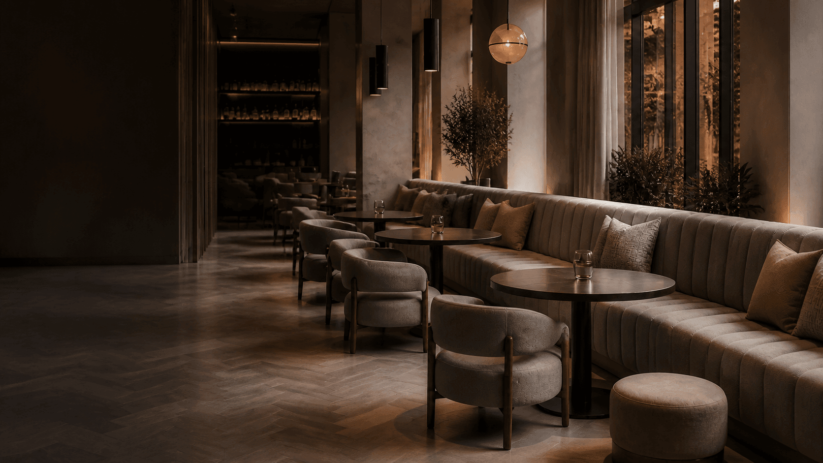A warm hospitality interior with custom upholstered banquette seating